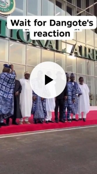 Dangote’s Reaction As Man Attempts To Put Tinubu Cap On Him