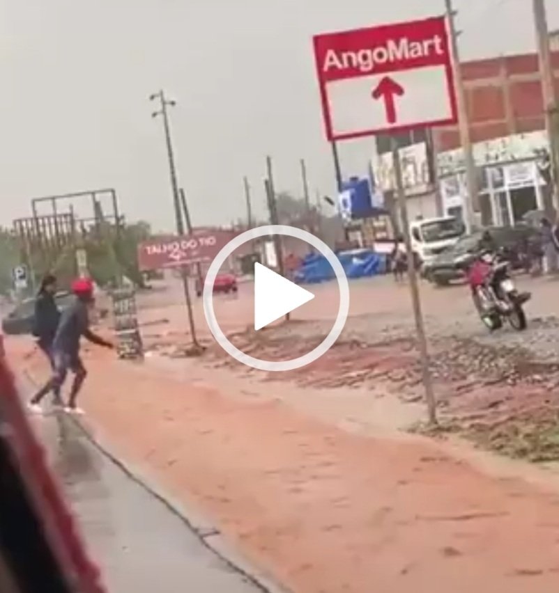 Drama As Lady Swept Away By Flood While Trying To Cross Gutter