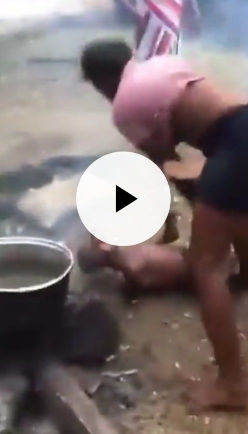 Drama As Man Grabs Big Cooking Stick From The Fire After Lady Takes Him Down, Beats Him Up Mercilessly In Public