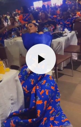 Lady Seen Struggling For Comfort While Seated At Event In Stylish Outfit