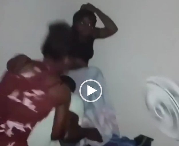 Chaos As Lady Attacks With Stick After Catching Her Man In Bed With Another Lady